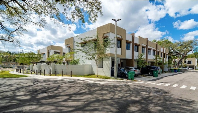 view of building exterior with a residential view