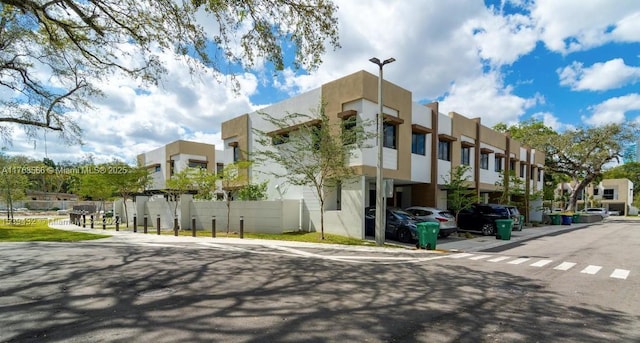 view of property with a residential view