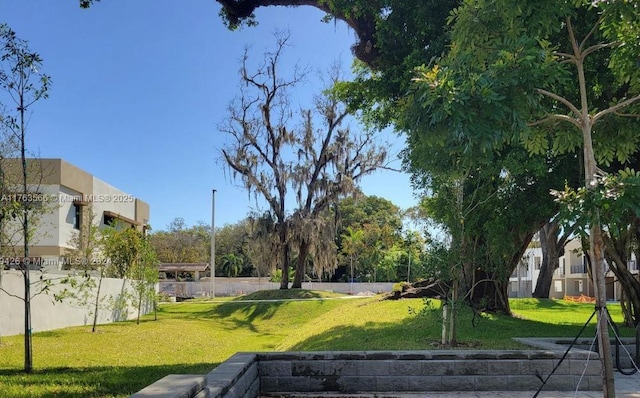 view of yard with fence