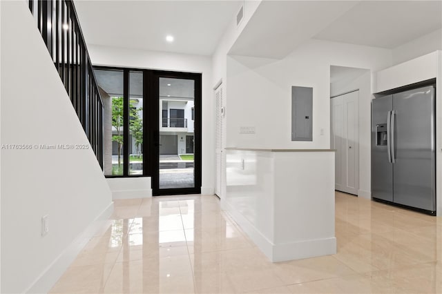 entrance foyer featuring electric panel, visible vents, baseboards, and marble finish floor