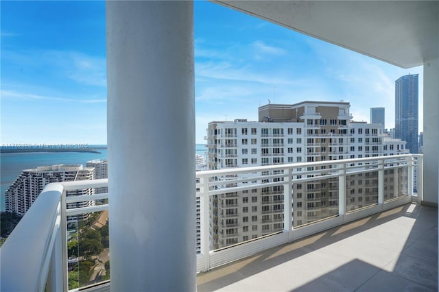 balcony with a city view and a water view