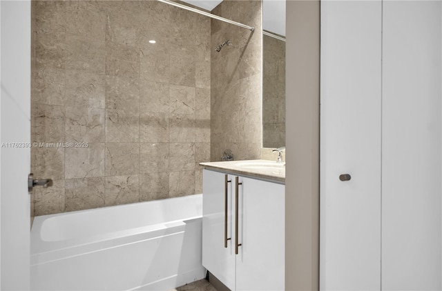 bathroom featuring shower / bath combination and vanity