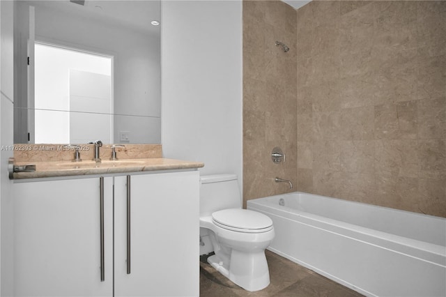 bathroom with vanity, shower / tub combination, and toilet