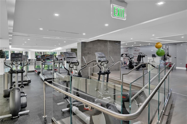 exercise room with recessed lighting