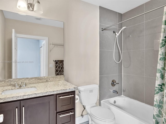 full bathroom with vanity, toilet, and shower / bath combo with shower curtain