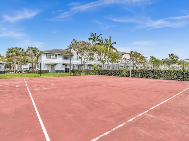 view of sport court with community basketball court and fence