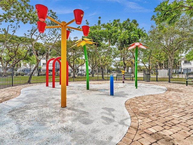 view of jungle gym with fence