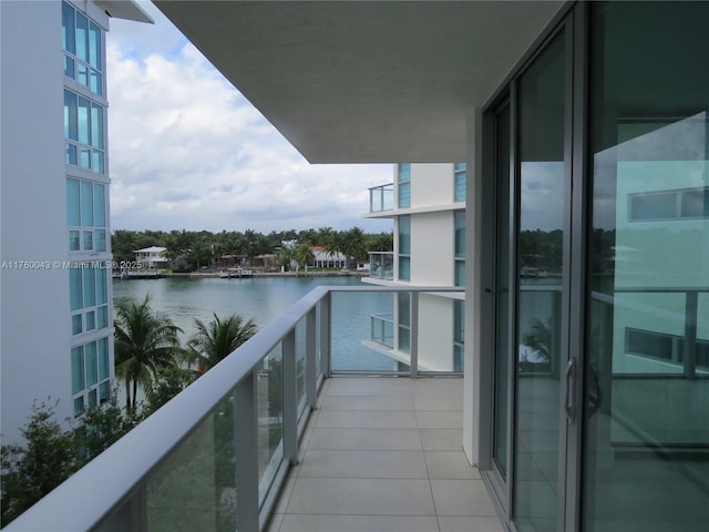 balcony featuring a water view