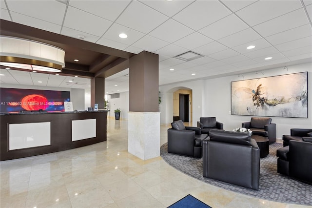 reception area featuring visible vents and arched walkways