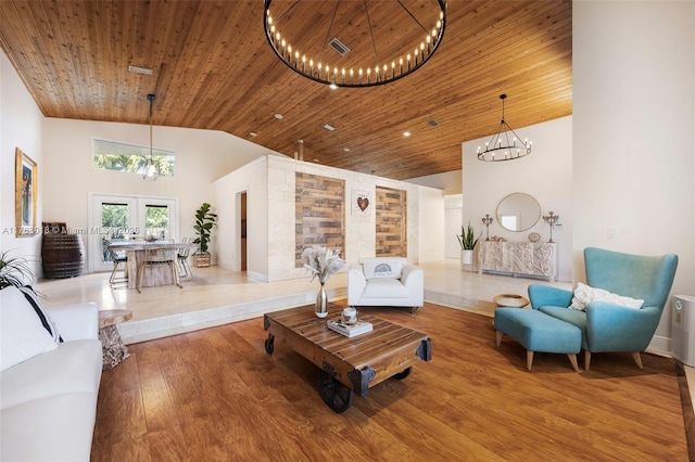 living room with wood finished floors, high vaulted ceiling, wood ceiling, french doors, and a notable chandelier