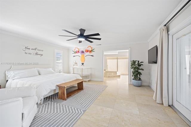 bedroom with ceiling fan, ensuite bath, crown molding, and baseboards