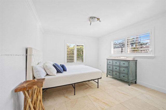 bedroom featuring baseboards and ornamental molding