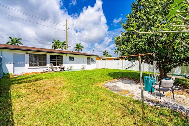 view of yard with fence