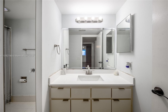 full bathroom featuring vanity and a shower with shower curtain