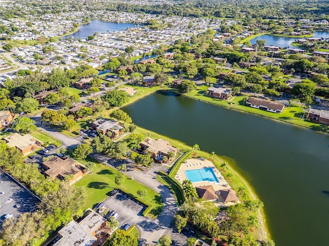 bird's eye view featuring a residential view and a water view