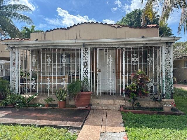 2162 NW 26th St, Miami, FL 33142 - entrance to property with fence
