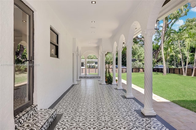 view of patio / terrace featuring fence