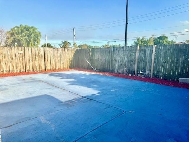 view of patio with a fenced backyard