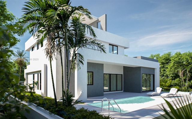 back of house with an outdoor pool, stucco siding, and a patio