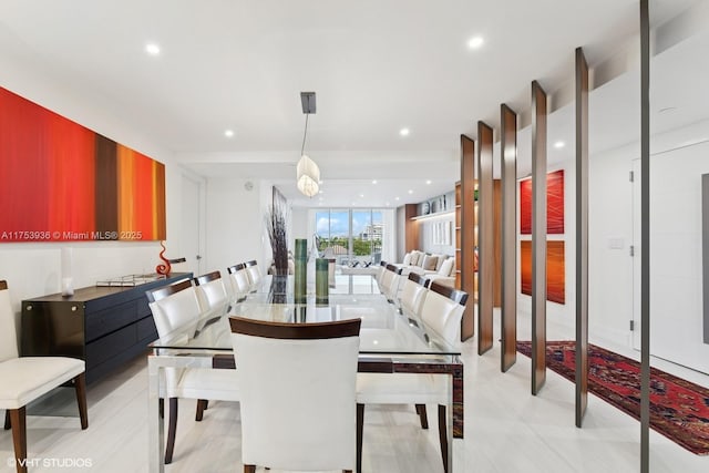 dining room with recessed lighting