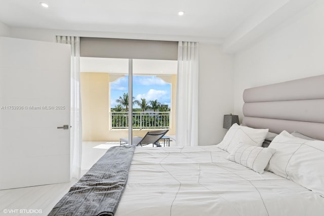 bedroom featuring recessed lighting and access to outside