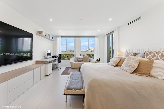 bedroom featuring visible vents and recessed lighting