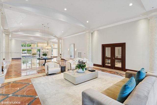 living room featuring marble finish floor, lofted ceiling, recessed lighting, baseboards, and ornate columns