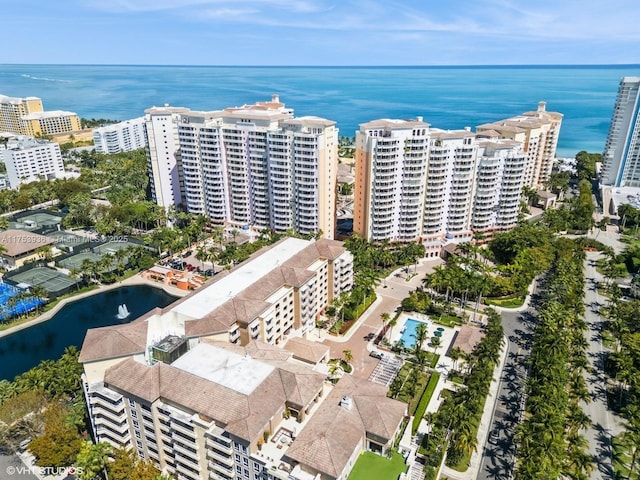 aerial view featuring a water view and a view of city