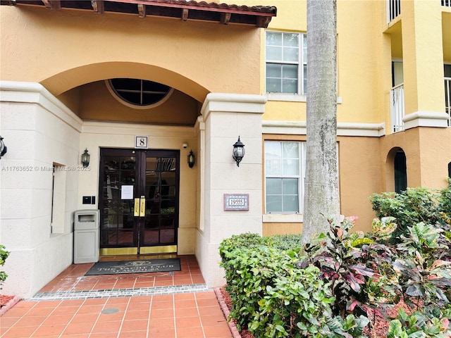 19555 E Country Club Dr Unit 8108, Aventura, FL 33180 - entrance to property featuring stucco siding and french doors