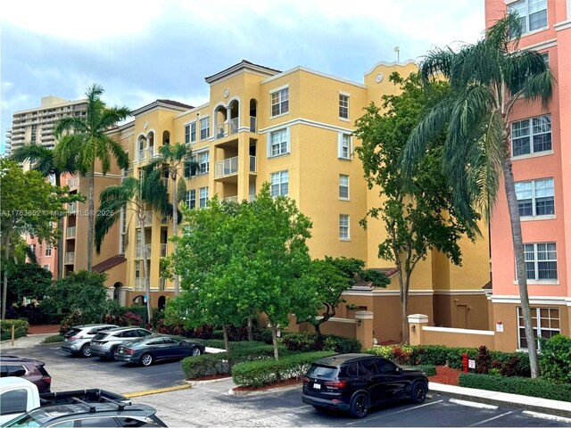 19555 E Country Club Dr Unit 8108, Aventura, FL 33180 - view of property with uncovered parking