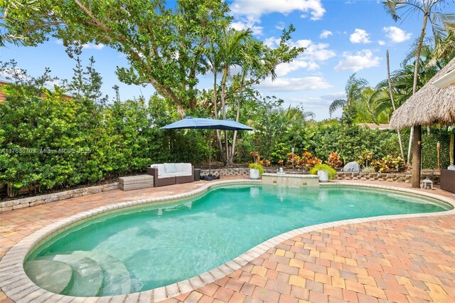 2395 SE 6th St, Pompano Beach, FL 33062 - outdoor pool featuring an outdoor living space and a patio area