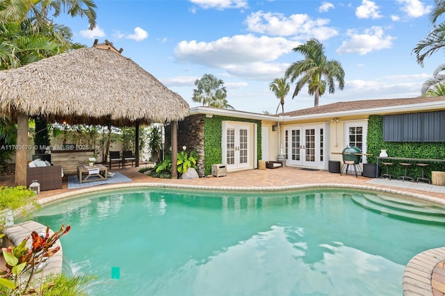 2395 SE 6th St, Pompano Beach, FL 33062 - outdoor pool featuring a patio area, french doors, and a gazebo