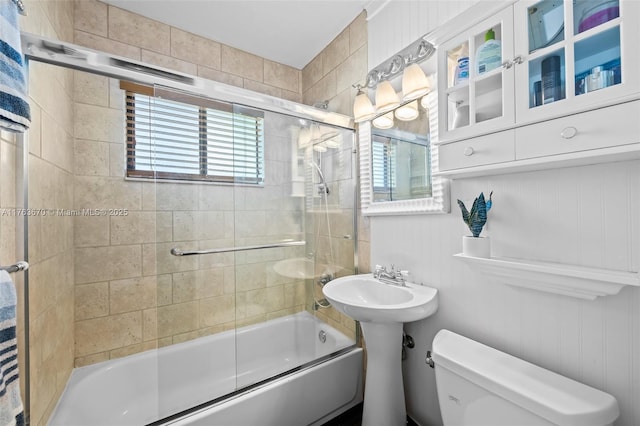 2395 SE 6th St, Pompano Beach, FL 33062 - bathroom with shower / bath combination with glass door and toilet