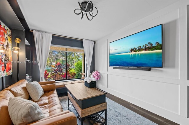 2395 SE 6th St, Pompano Beach, FL 33062 - living room featuring baseboards and wood finished floors