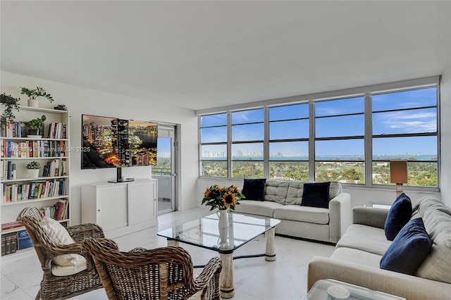 living room featuring marble finish floor