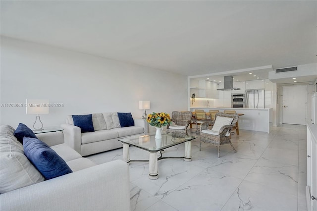 living room featuring recessed lighting, visible vents, and marble finish floor