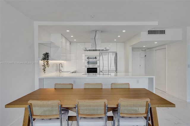 dining area with recessed lighting, visible vents, and marble finish floor