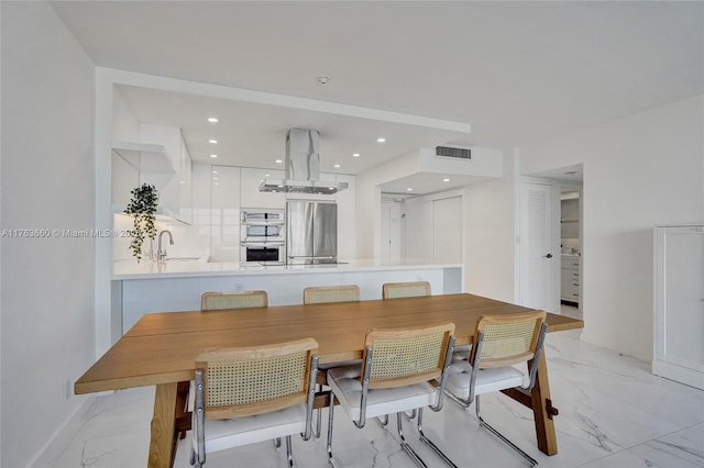 dining area with recessed lighting, visible vents, baseboards, and marble finish floor