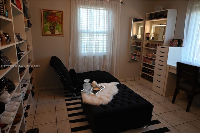 bedroom featuring light tile patterned floors