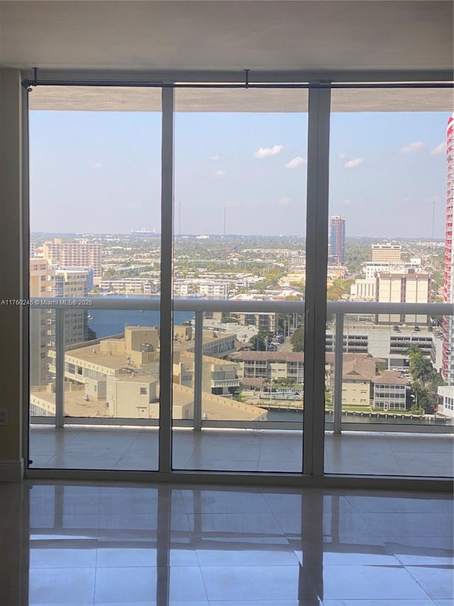 interior details with a view of city and a water view