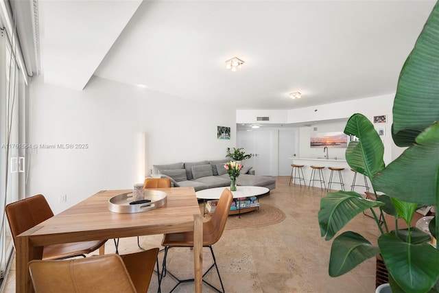 dining room with visible vents