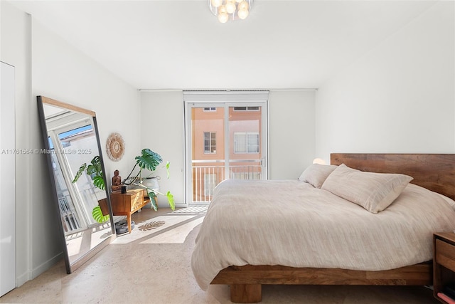 bedroom featuring access to exterior and multiple windows