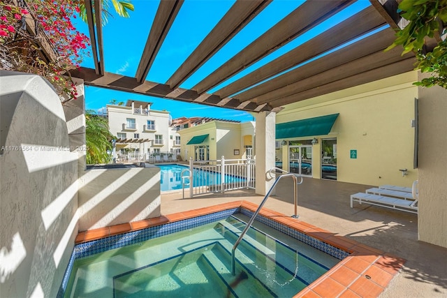 125 Jefferson Ave Unit 137, Miami Beach, FL 33139 - community pool featuring a hot tub and a patio area