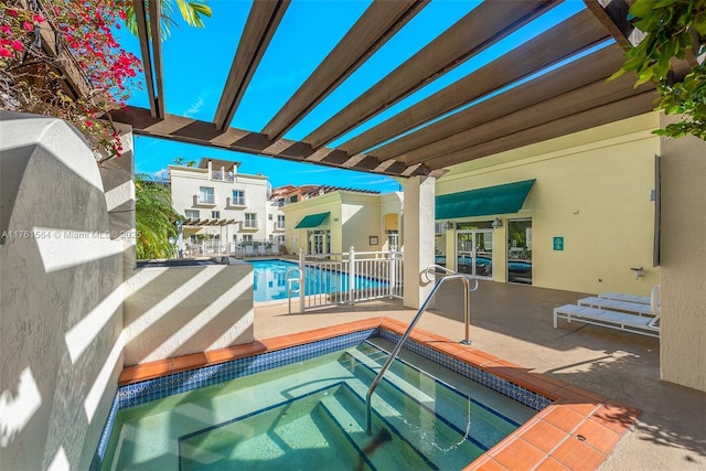 pool featuring a community hot tub