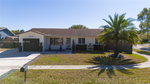 ranch-style home with stucco siding, driveway, a front yard, and a garage