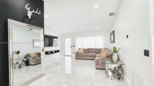 living area with baseboards, visible vents, and high vaulted ceiling