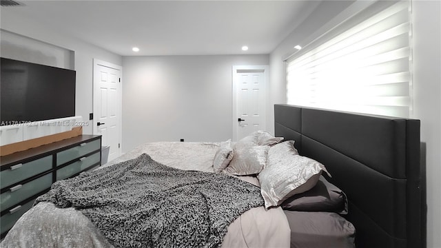 bedroom featuring recessed lighting