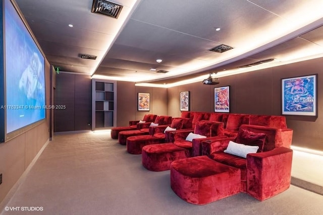 home theater with visible vents and carpet floors