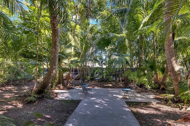 view of home's community featuring a patio area