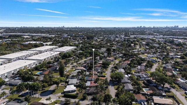 birds eye view of property with a city view